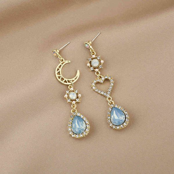925 silver needle baroque moon inlaid diamond hollow love blue water drop diamond personalized versatile earrings
925 silver needle baroque moon inlaid diamond hollow love blue water drop diamond personalized versatile earrings