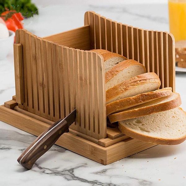 natural bamboo bread slicer with crumb tray compact cutter for slicing homemade french baked baking & pastry tools
natural bamboo bread slicer with crumb tray compact cutter for slicing homemade french baked baking & pastry tools
