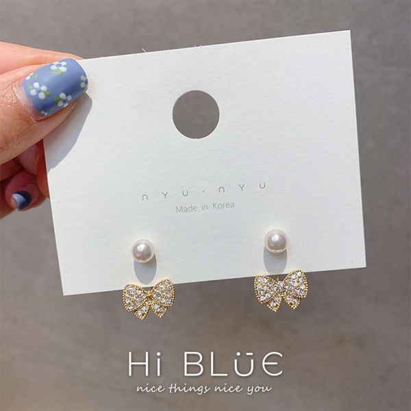 s925 silver needle korean diamond inlaid small bow pearl women's simple temperament earrings, Black
s925 silver needle korean diamond inlaid small bow pearl women's simple temperament earrings, Black