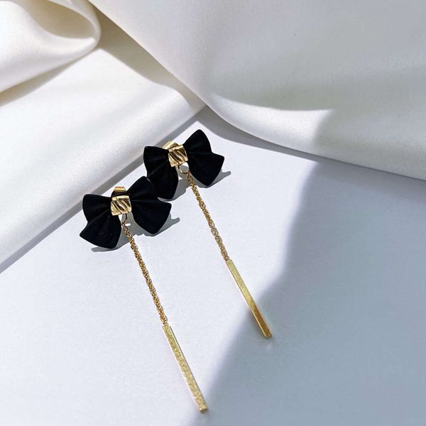 black bow tassel female korean temperament niche design ear stud two wear long earrings
black bow tassel female korean temperament niche design ear stud two wear long earrings
