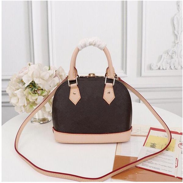 alma bb handbag golden padlock keys 2 toron handles fitted with detachable strap charming small bag perfect for crossbody wear
alma bb handbag golden padlock keys 2 toron handles fitted with detachable strap charming small bag perfect for crossbody wear
