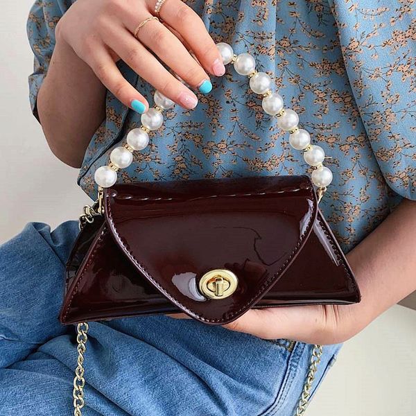 evening bags patent leather bright face women's spring fashion net red pearl hand dinner chain shoulder
evening bags patent leather bright face women's spring fashion net red pearl hand dinner chain shoulder