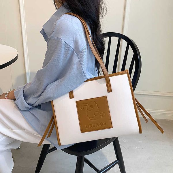 net red 2021 fashion simple portable shoulder bag embossed letters contrast ins large capacity tote bag
net red 2021 fashion simple portable shoulder bag embossed letters contrast ins large capacity tote bag