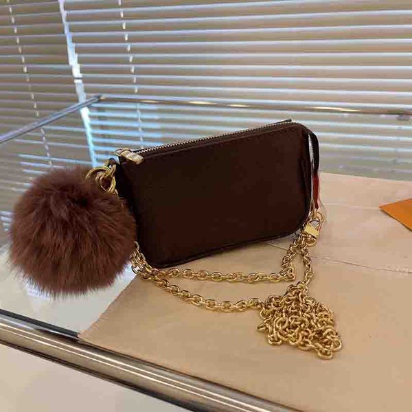 luxurys woman pochette bag designers clutch bags with pom poms or pendant durable shoulder purse small size large capacity tote handbag
luxurys woman pochette bag designers clutch bags with pom poms or pendant durable shoulder purse small size large capacity tote handbag