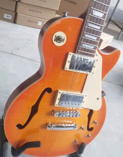guitarra eléctrica alta calidad , instrumento electric guitar musical madera arce flameado, f hole,silver hardware,exhibición de fotos re
guitarra eléctrica alta calidad , instrumento electric guitar musical madera arce flameado, f hole,silver hardware,exhibición de fotos re
