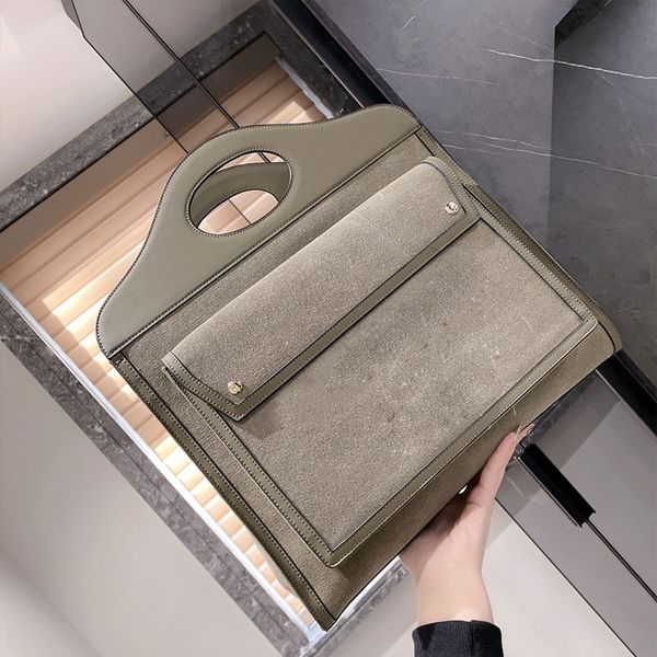 handbag shoulder bag fashion canvas bag special handle style hardware details embellishment premium leather detachable shoulder strap 
handbag shoulder bag fashion canvas bag special handle style hardware details embellishment premium leather detachable shoulder strap