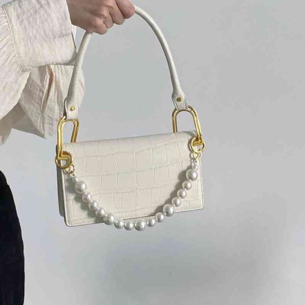 gradient summer 2021 stone spring underarm pearl handbag one shoulder french stick women's bag
gradient summer 2021 stone spring underarm pearl handbag one shoulder french stick women's bag