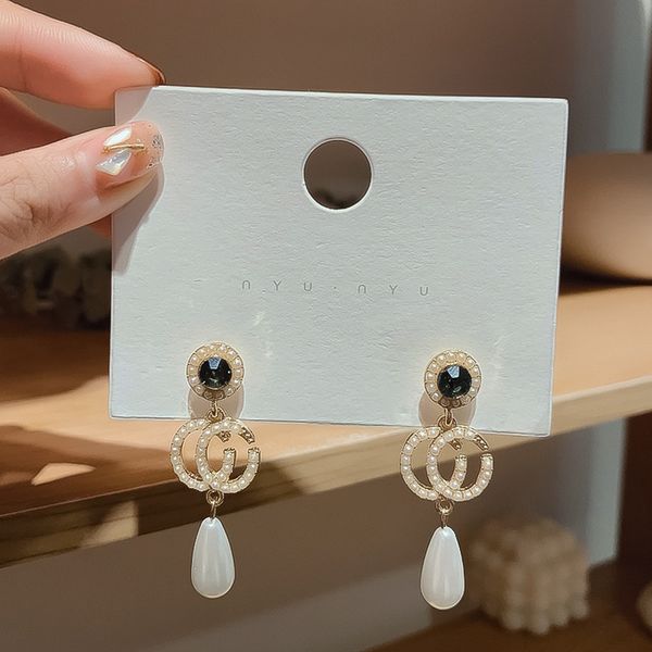 925 silver needle letter pearl earrings elegant temperament diamond long earrings fashion simple fashion earrings
925 silver needle letter pearl earrings elegant temperament diamond long earrings fashion simple fashion earrings