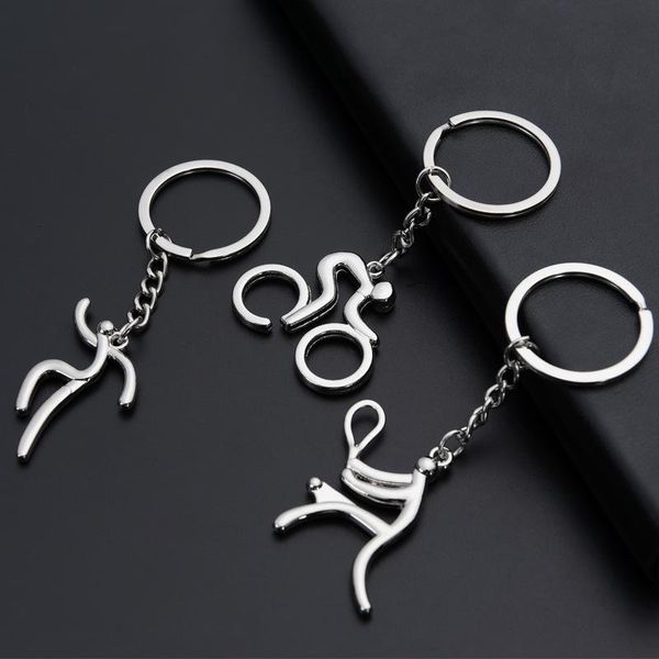 keychains sports riding bicycle run weightlifting play tennis football basketball cycling figure keychain metal keyring souvenirs gift, Silver
keychains sports riding bicycle run weightlifting play tennis football basketball cycling figure keychain metal keyring souvenirs gift, Silver