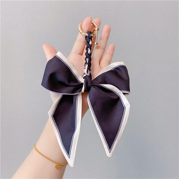 keychains elegant black color flower scarf ribbon bow-knot keychain for women bag pendant car key chain fashion accessories, Silver
keychains elegant black color flower scarf ribbon bow-knot keychain for women bag pendant car key chain fashion accessories, Silver