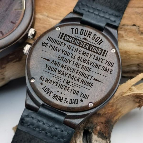 mom and dad give son a wood watch sculpting contents of the night light pointer to his graduation birthday present wristwatches, Slivery;brown
mom and dad give son a wood watch sculpting contents of the night light pointer to his graduation birthday present wristwatches, Slivery;brown