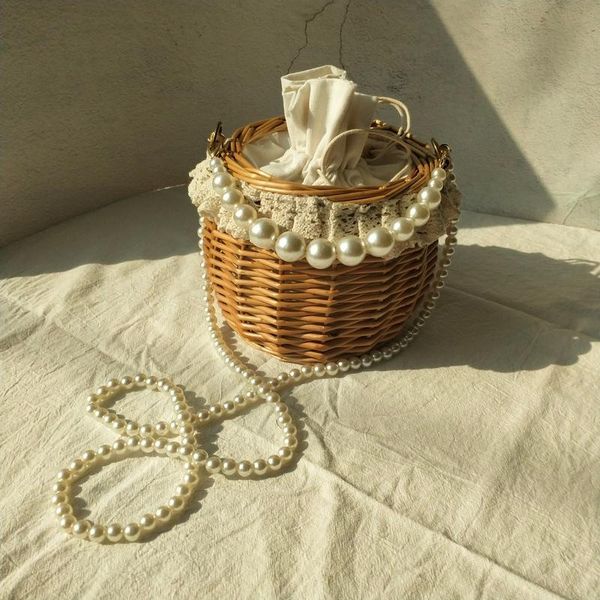 pearl bag straw ins hand-woven rattan hand holiday small round chain cross body
pearl bag straw ins hand-woven rattan hand holiday small round chain cross body