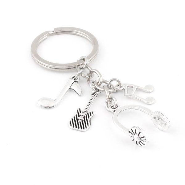 new arrival music dj headphone keychain guitar musical note keyring gifts for men women jewelry accessories e2581, Silver
new arrival music dj headphone keychain guitar musical note keyring gifts for men women jewelry accessories e2581, Silver