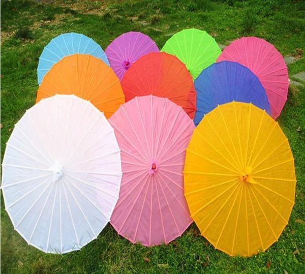 umbrellas 50pcs chinese colored paper umbrella white pink parasols china traditional dance color parasol japanese silk wedding props sn128
umbrellas 50pcs chinese colored paper umbrella white pink parasols china traditional dance color parasol japanese silk wedding props sn128