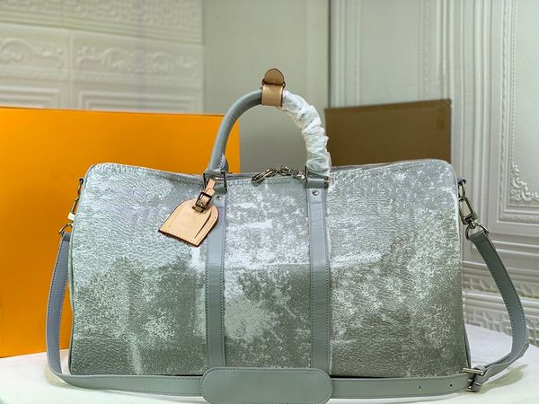 designer men and women travel bag large capacity canvas leather fashion soft with zipper hand-carried shoulder-back available size 50-28-23
designer men and women travel bag large capacity canvas leather fashion soft with zipper hand-carried shoulder-back available size 50-28-23