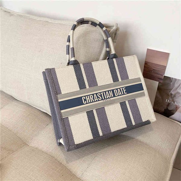 design jewelry women's summer new fashion canvas schoolgirl portable tote net red large capacity plaid single shoulder bag
design jewelry women's summer new fashion canvas schoolgirl portable tote net red large capacity plaid single shoulder bag