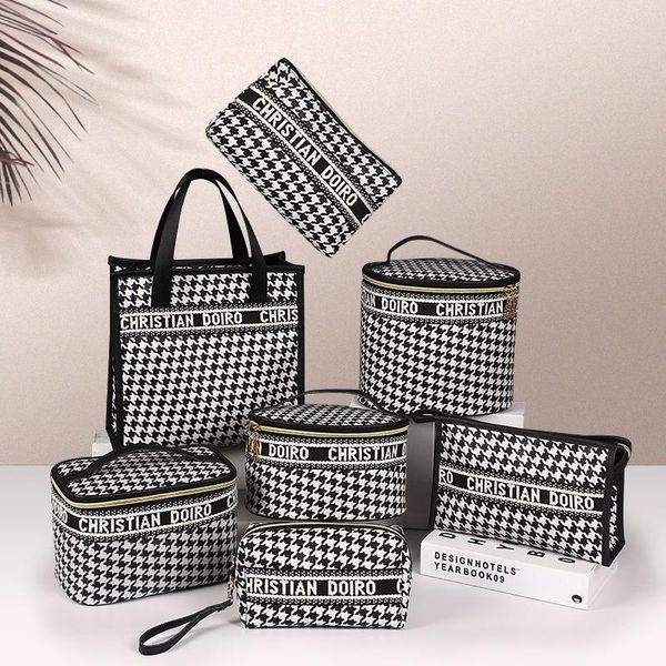 storage bags plaid bag black and white cosmetic custom portable large handbag european american fashion briefcase
storage bags plaid bag black and white cosmetic custom portable large handbag european american fashion briefcase
