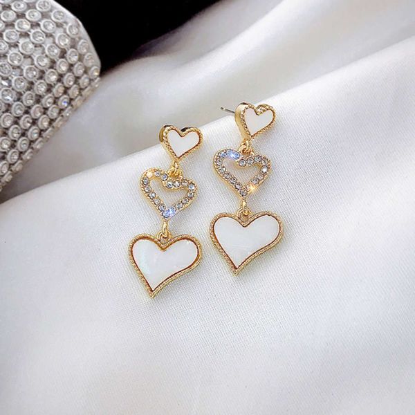 s925 silver needle new korean version size three love peach hollow set diamond heart temperament earrings, Black
s925 silver needle new korean version size three love peach hollow set diamond heart temperament earrings, Black
