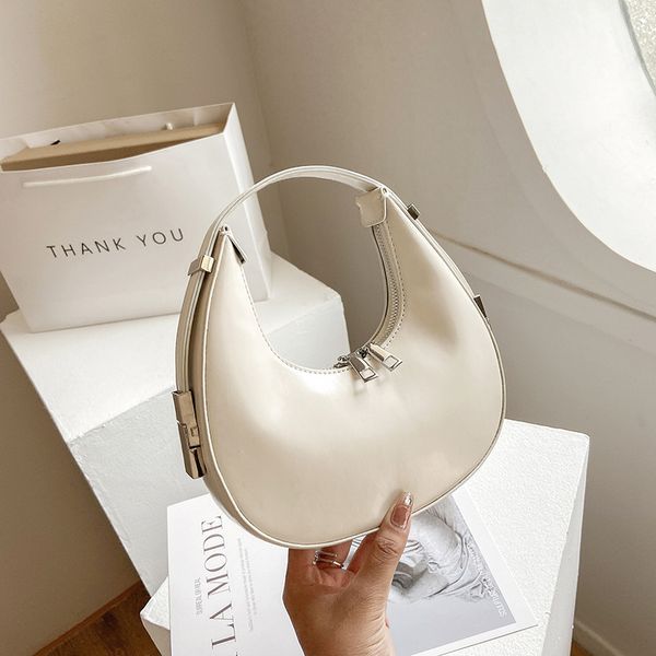 trend fashion simple shoulder 2021 new portable crescent armpit stick hand carrying women's small round bag
trend fashion simple shoulder 2021 new portable crescent armpit stick hand carrying women's small round bag