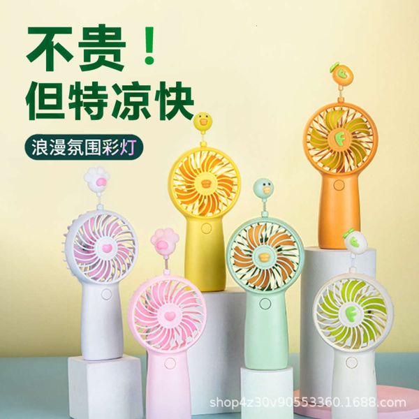 electric fans product cute cartoon handheld usb charging small summer night light portable mini fan
electric fans product cute cartoon handheld usb charging small summer night light portable mini fan