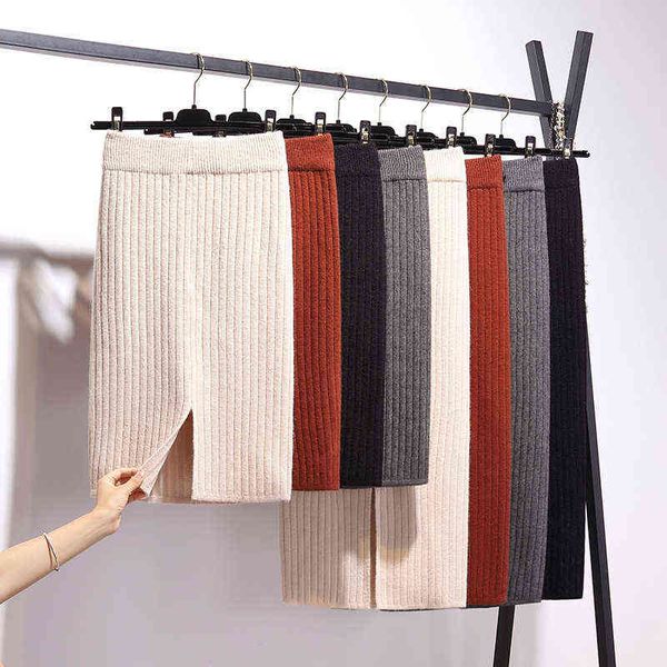 autumn winter knitted skirts women korean fashion elastic high waist black skirt ladies elegant split midi skirt mujer faldas 211120
autumn winter knitted skirts women korean fashion elastic high waist black skirt ladies elegant split midi skirt mujer faldas 211120