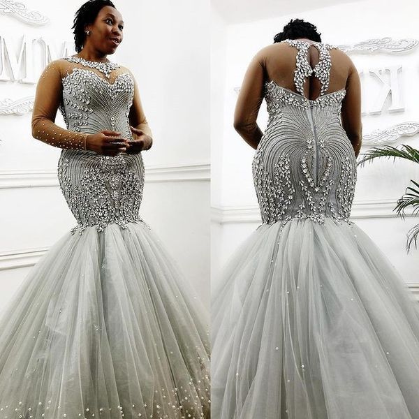 2021 plus size arabic aso ebi luxurious crystals mermaid wedding gowns sheer neck long sleeves bridal dresses zj255, White
2021 plus size arabic aso ebi luxurious crystals mermaid wedding gowns sheer neck long sleeves bridal dresses zj255, White