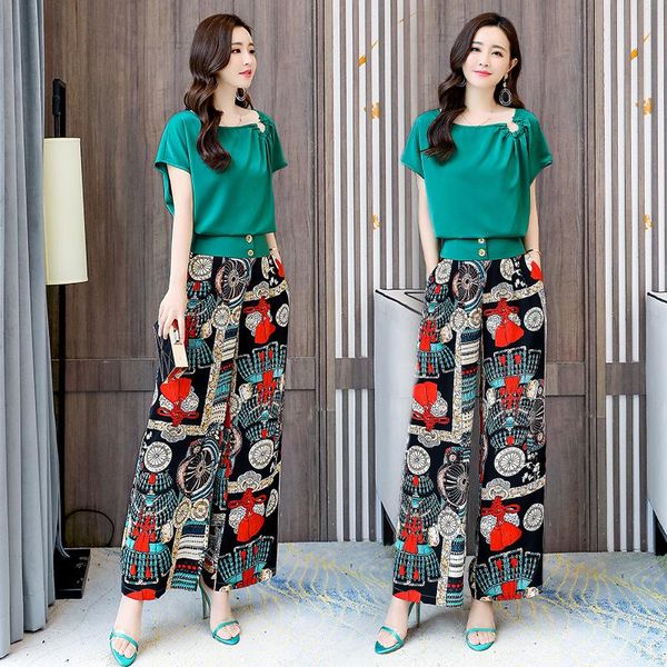 women's tracksuits 2021 summer women two piece sets solid short sleeve o-neck shirt+flroal wide leg pants trousers lady 2 pieces suits, Gray
women's tracksuits 2021 summer women two piece sets solid short sleeve o-neck shirt+flroal wide leg pants trousers lady 2 pieces suits, Gray