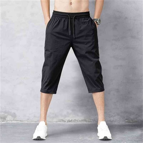 men's shorts summer breeches thin nylon 3/4 length trousers male bermuda board quick drying beach black men's long shorts 210330, White;black
men's shorts summer breeches thin nylon 3/4 length trousers male bermuda board quick drying beach black men's long shorts 210330, White;black