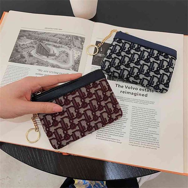 autumn and winter new women's wallet simple fashion short zipper versatile popular key bag, Red;black
autumn and winter new women's wallet simple fashion short zipper versatile popular key bag, Red;black