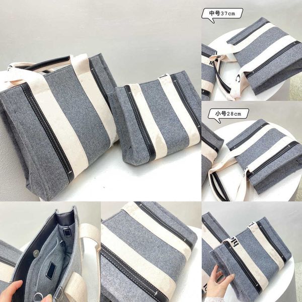 2021 autumn and winter new shoulder bag letter print stripe large capacity handbag woody tote bag canvas women japanese casual handbag
2021 autumn and winter new shoulder bag letter print stripe large capacity handbag woody tote bag canvas women japanese casual handbag