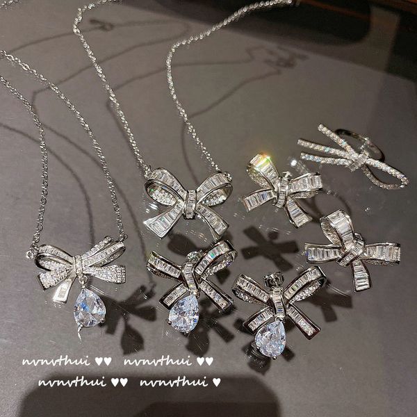 strands strings bright bow necklace with 18k gold plated eight heart arrow water drop zircon full diamond earrings, Black
strands strings bright bow necklace with 18k gold plated eight heart arrow water drop zircon full diamond earrings, Black