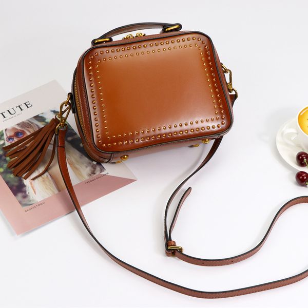 design hand new rivet small square bag fashion tassel leather hand-held trend versatile one shoulder slant span women's bag
design hand new rivet small square bag fashion tassel leather hand-held trend versatile one shoulder slant span women's bag