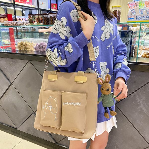 large capacity one shoulder women's new leisure travel tote bag light student class nylon hand-held messenger
large capacity one shoulder women's new leisure travel tote bag light student class nylon hand-held messenger