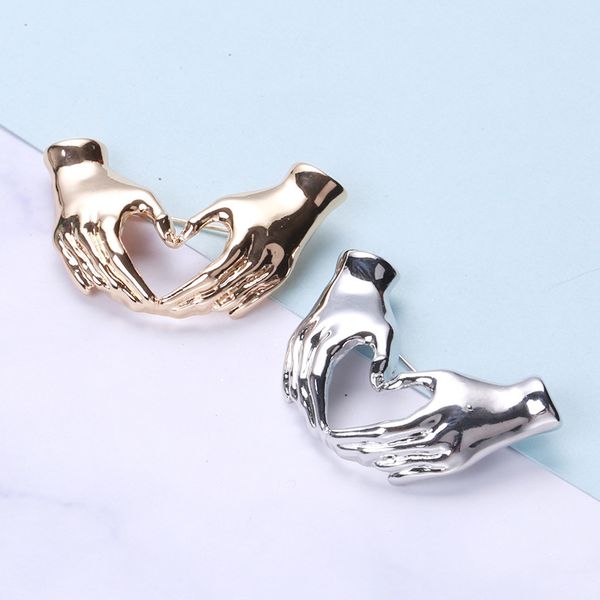 factory creative personality hands than heart brooch minority gesture simple elegant sweater coat accessories christmas
factory creative personality hands than heart brooch minority gesture simple elegant sweater coat accessories christmas