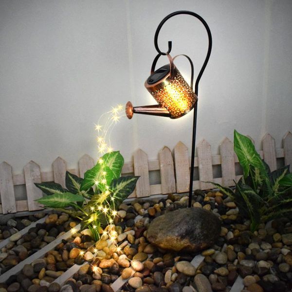 solar lamps courtyard outdoor waterproof water kettle running shower lamp wrought iron hollow ground landscape decoration
solar lamps courtyard outdoor waterproof water kettle running shower lamp wrought iron hollow ground landscape decoration