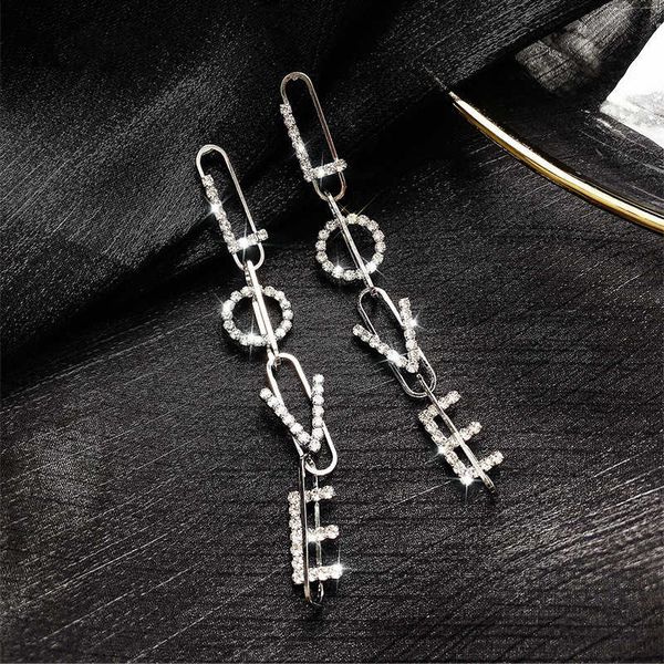 high level love letter fashion net red earrings women's long temperament 925 silver pin earrings
high level love letter fashion net red earrings women's long temperament 925 silver pin earrings