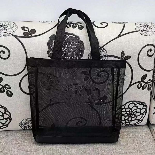 2c classic white logo mesh shopping bag luxury pattern travel wash bag women storage mesh case
2c classic white logo mesh shopping bag luxury pattern travel wash bag women storage mesh case