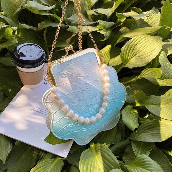 shoulder bags stone pattern pearl mini tote bag 2021 summer high-quality pu leather women's designer handbag chain messenger
shoulder bags stone pattern pearl mini tote bag 2021 summer high-quality pu leather women's designer handbag chain messenger