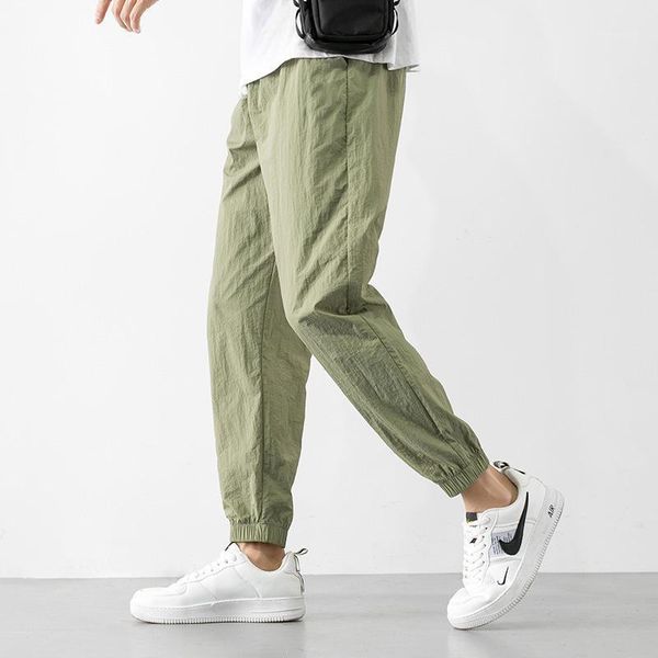 spring and autumn casual pants men's 9-point harlan sports thin elastic waist with drawstring, Black 
spring and autumn casual pants men's 9-point harlan sports thin elastic waist with drawstring, Black