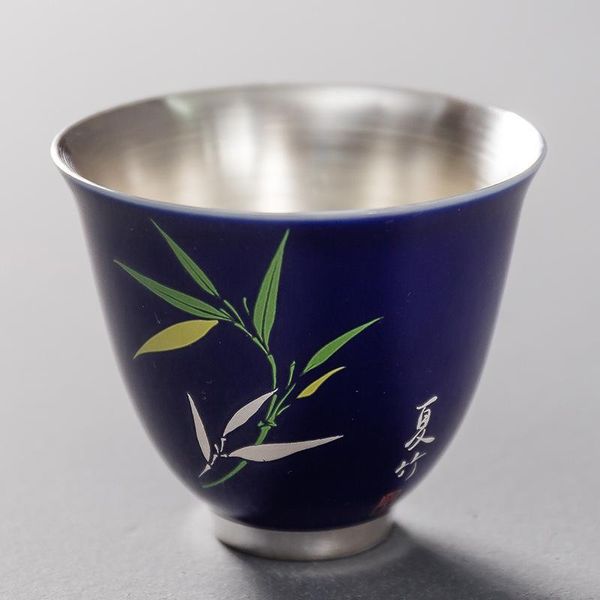silver gilt cup of merlin bamboo and chrysanthemum tea with master teacup cups & saucers
silver gilt cup of merlin bamboo and chrysanthemum tea with master teacup cups & saucers