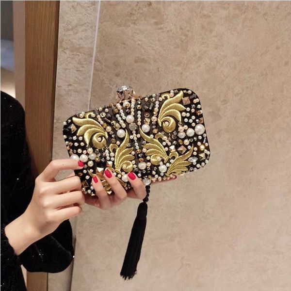 2021 silk style embroidery party dinner bag handmade with black tassel and diamond
2021 silk style embroidery party dinner bag handmade with black tassel and diamond