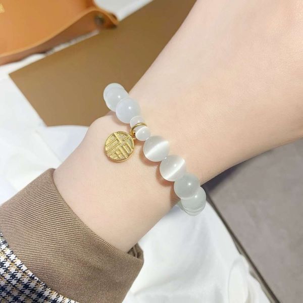 temperament show white fu character pendant sand gold jewelry women never fade moonlight stone beads elastic rope bracelet, Black
temperament show white fu character pendant sand gold jewelry women never fade moonlight stone beads elastic rope bracelet, Black