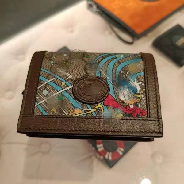 luxury design handbag 2021 new factory gujia cartoon donald zero mini card bag wallet, Red;black
luxury design handbag 2021 new factory gujia cartoon donald zero mini card bag wallet, Red;black