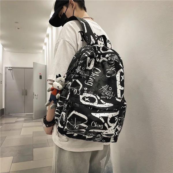backpack fashion mens black white graffiti boys girls large capacity schoolbag teenagers college bagpack travel bag
backpack fashion mens black white graffiti boys girls large capacity schoolbag teenagers college bagpack travel bag