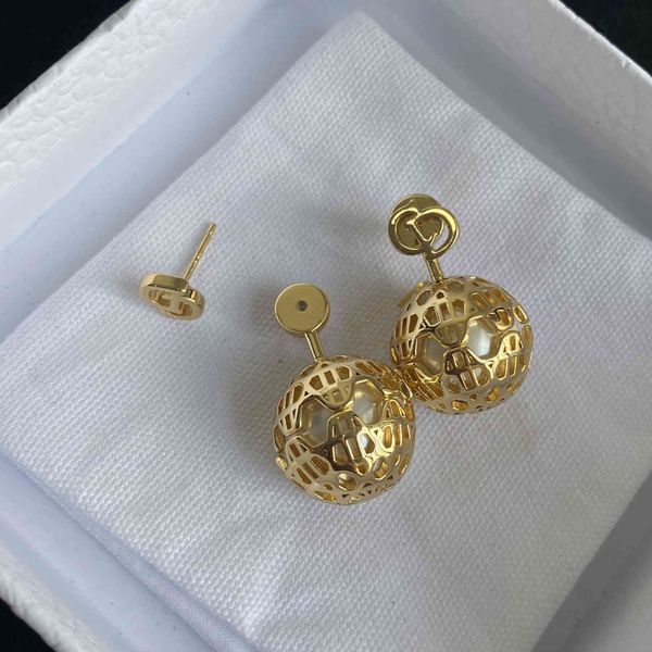 earrings charm studdi family d cd letter classic spherical rattan hollowed out pearl , women wearing light luxury before and, Golden
earrings charm studdi family d cd letter classic spherical rattan hollowed out pearl , women wearing light luxury before and, Golden