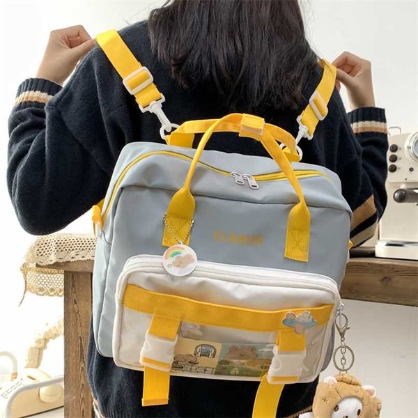 dcimor contrast color multifunction waterproof nylon women backpack female transparent pocket insert buckle small schoolbag 211025
dcimor contrast color multifunction waterproof nylon women backpack female transparent pocket insert buckle small schoolbag 211025