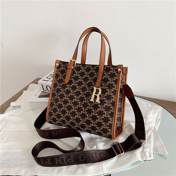 luxury handbags net red women's bag 2021 summer new fashion letter portable tote wide shoulder strap single shoulder messenger bag
luxury handbags net red women's bag 2021 summer new fashion letter portable tote wide shoulder strap single shoulder messenger bag