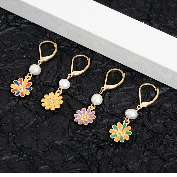 dangle & chandelier korea style model daisy earrings natural pearl yellow enamel flower clip-on for women and ladies, Silver
dangle & chandelier korea style model daisy earrings natural pearl yellow enamel flower clip-on for women and ladies, Silver