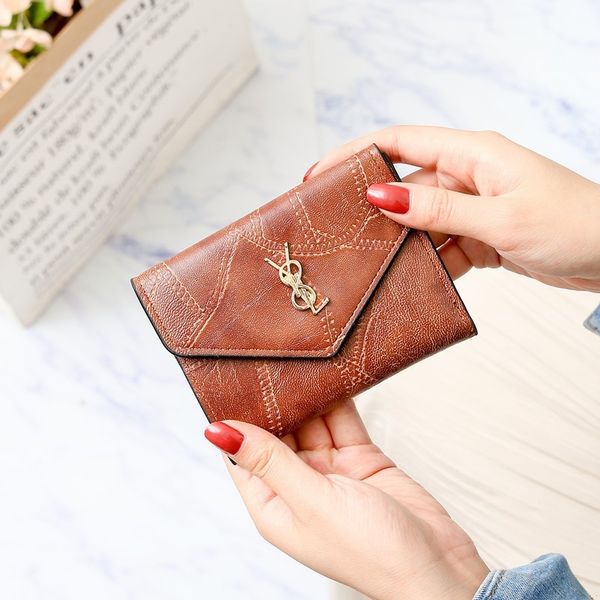 2019 new korean fashion wallet women's short folding small simple buckle card bag zero wallet, Red;black
2019 new korean fashion wallet women's short folding small simple buckle card bag zero wallet, Red;black