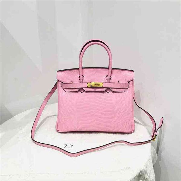 new leather women's bag lizard pattern gold button cowhide bag fashion classic one shoulder messenger bagszly zly
new leather women's bag lizard pattern gold button cowhide bag fashion classic one shoulder messenger bagszly zly